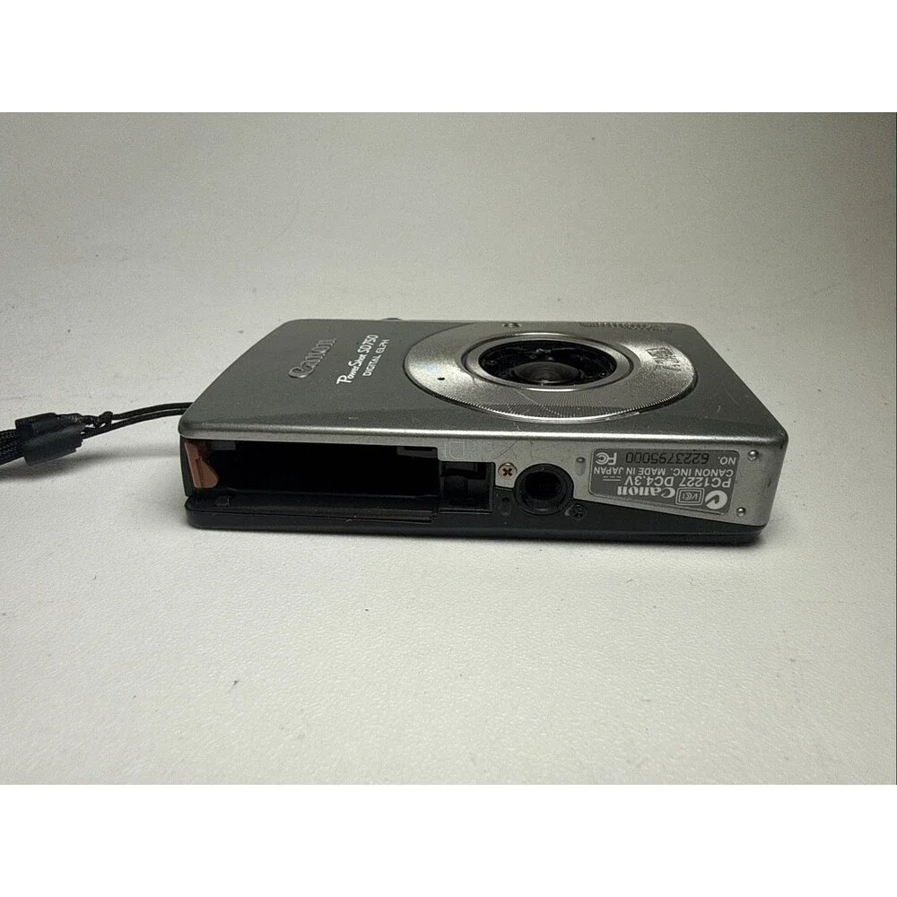 Canon PowerShot SD750 Digital ELPH Camera Silver Works, Missing Battery Door